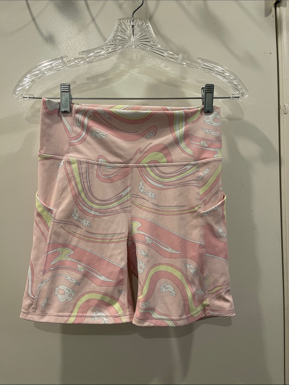 Fabletics Pink Swirl High-Rise Bike Shorts with Side Pockets